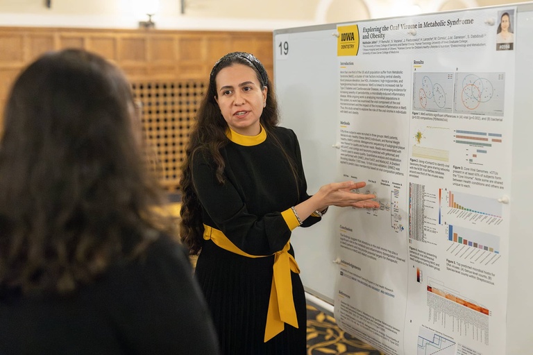 A graduate student presents their research at the 2025 Jakobsen Conference.