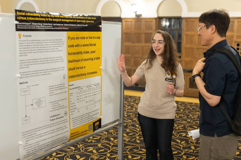 A graduate student presents their research at the 2025 Jakobsen Conference.
