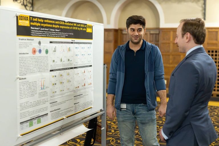 A graduate student presents their research at the 2025 Jakobsen Conference.