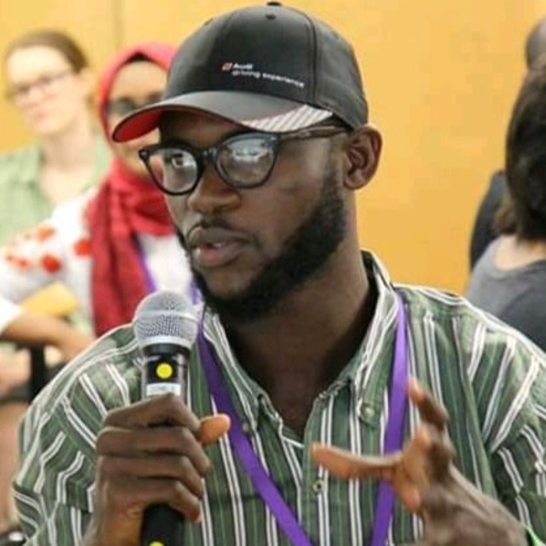 Portrait of Mubarak Mojoyinola